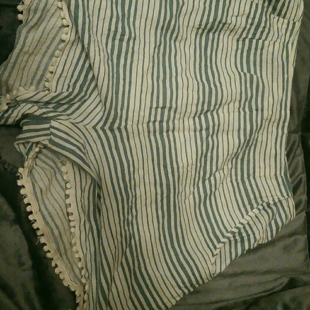 Teal and cream colored shorts